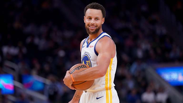 Stephen Curry Signs Shoes for Fans After Warriors Game